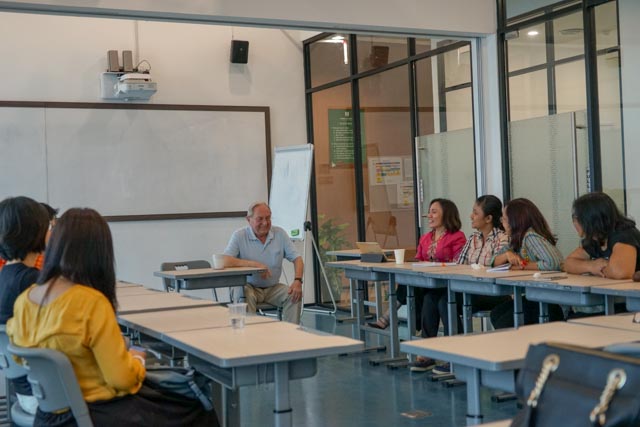 meet prof frank monks with noble academy team and students