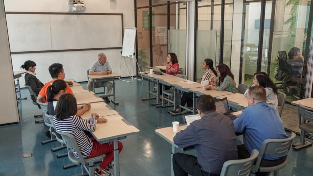 meet prof frank monks with noble academy team and students