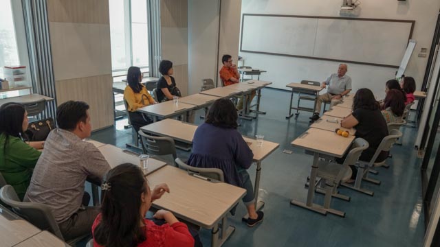 meet prof frank monks with noble academy team and students